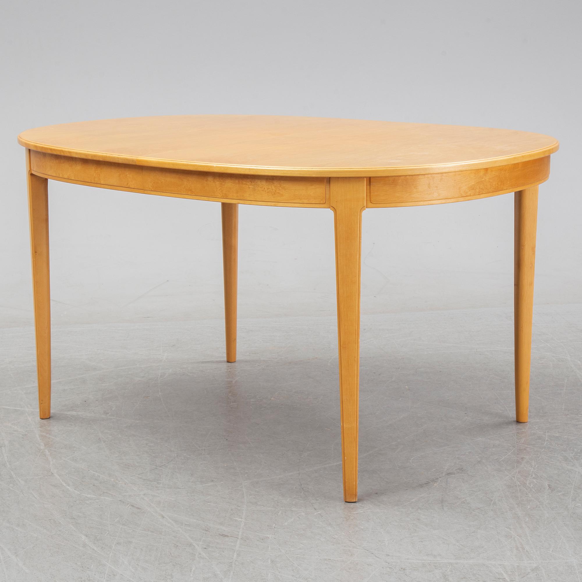 Carl Malmsten, a set of six 'Ambassadör' chairs and a 'Herrgården' dining table, second half of the 20th Century.