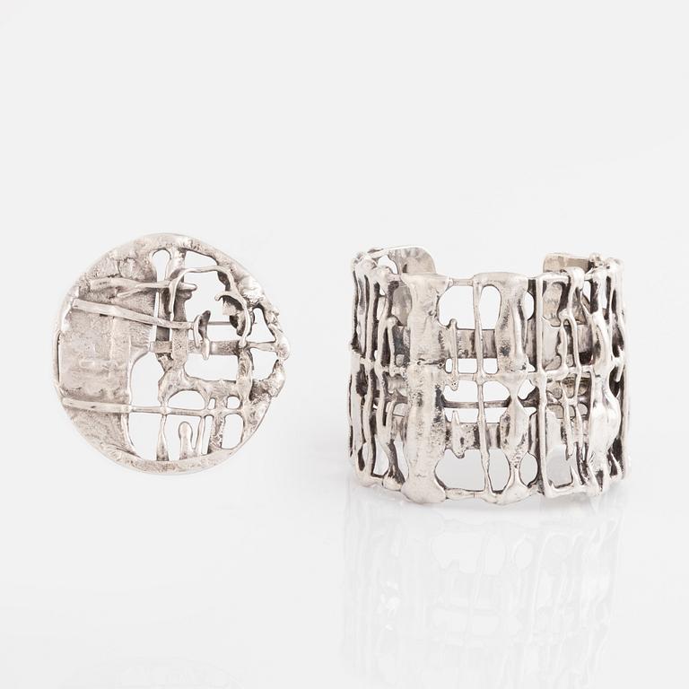 Olle Ohlsson, bangle and brooch, silver.
