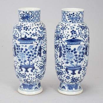 A pair of blue and white figural vases, Qing dynasty, late 19th century.