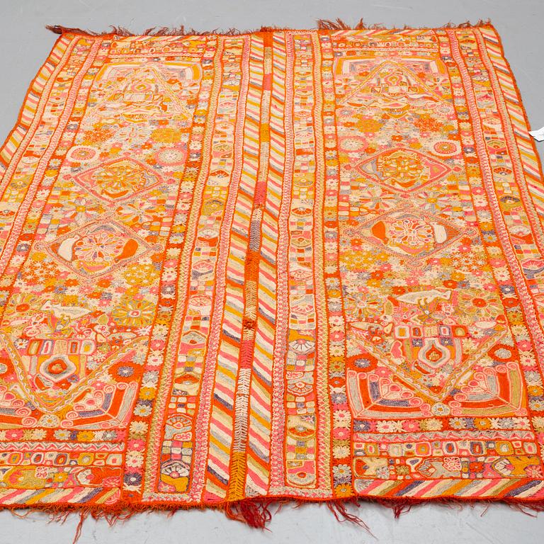 A semi-antique embroidered textile by the Marsh Arabs/nomads in Iraq, ca 232 x 164 cm.