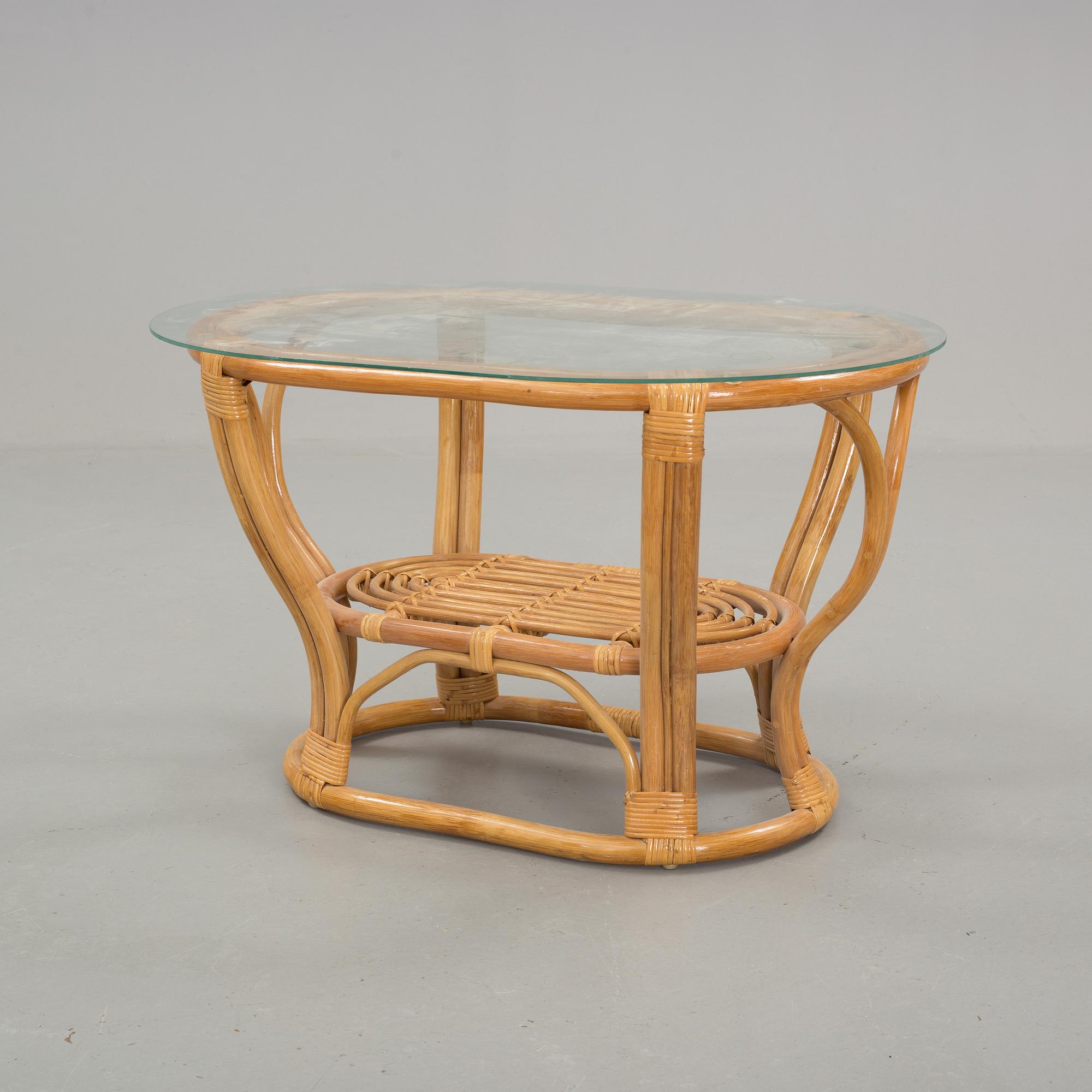A set of sofa, easy chairs and table in four parts, late 20th century.