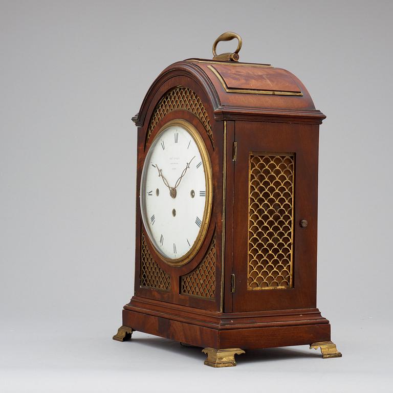 An early 19th century brass-mounted mahogany striking table clock by Francis Putley (1806-42) Newington Surry England.