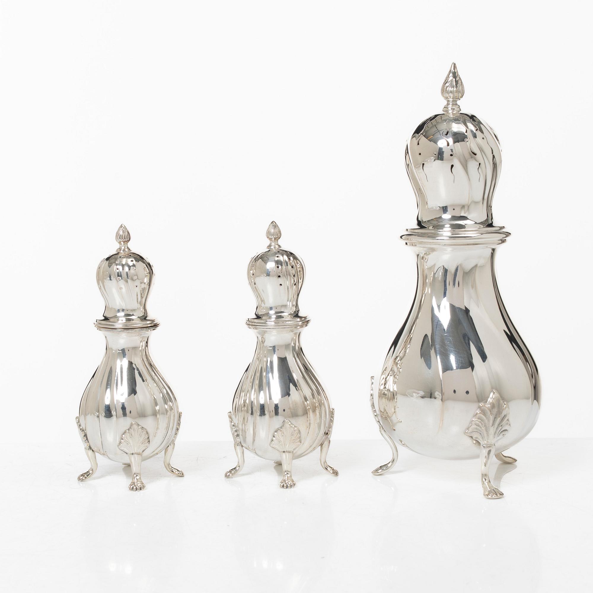 Sugar caster and salt and pepper shakers, silver, marked C.G. Hallberg, including Stockholm 1948.