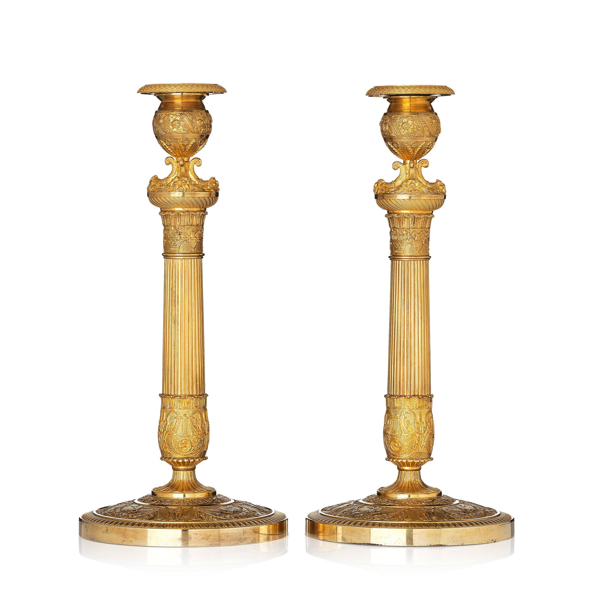 A pair of French Empire candlesticks, early 19th century.