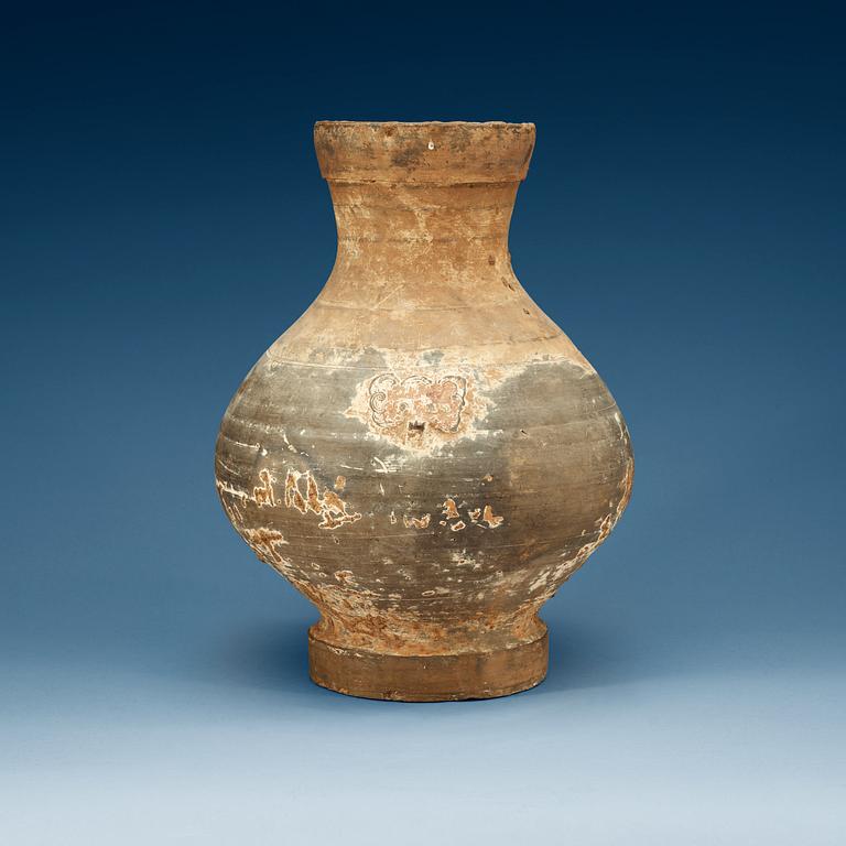 A unglazed jar, Han dynasty, (206 BC - 220 AD).