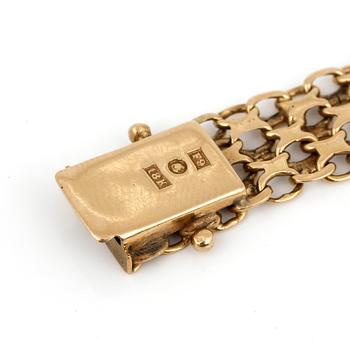 ARMLÄNK, 18K guld, Stockholm, 1956. Total vikt ca 16,69 g.