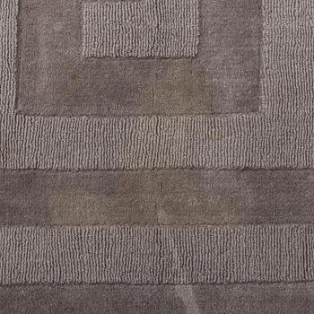 A Layered "Wool Cubes" carpet, 390x620 cm.