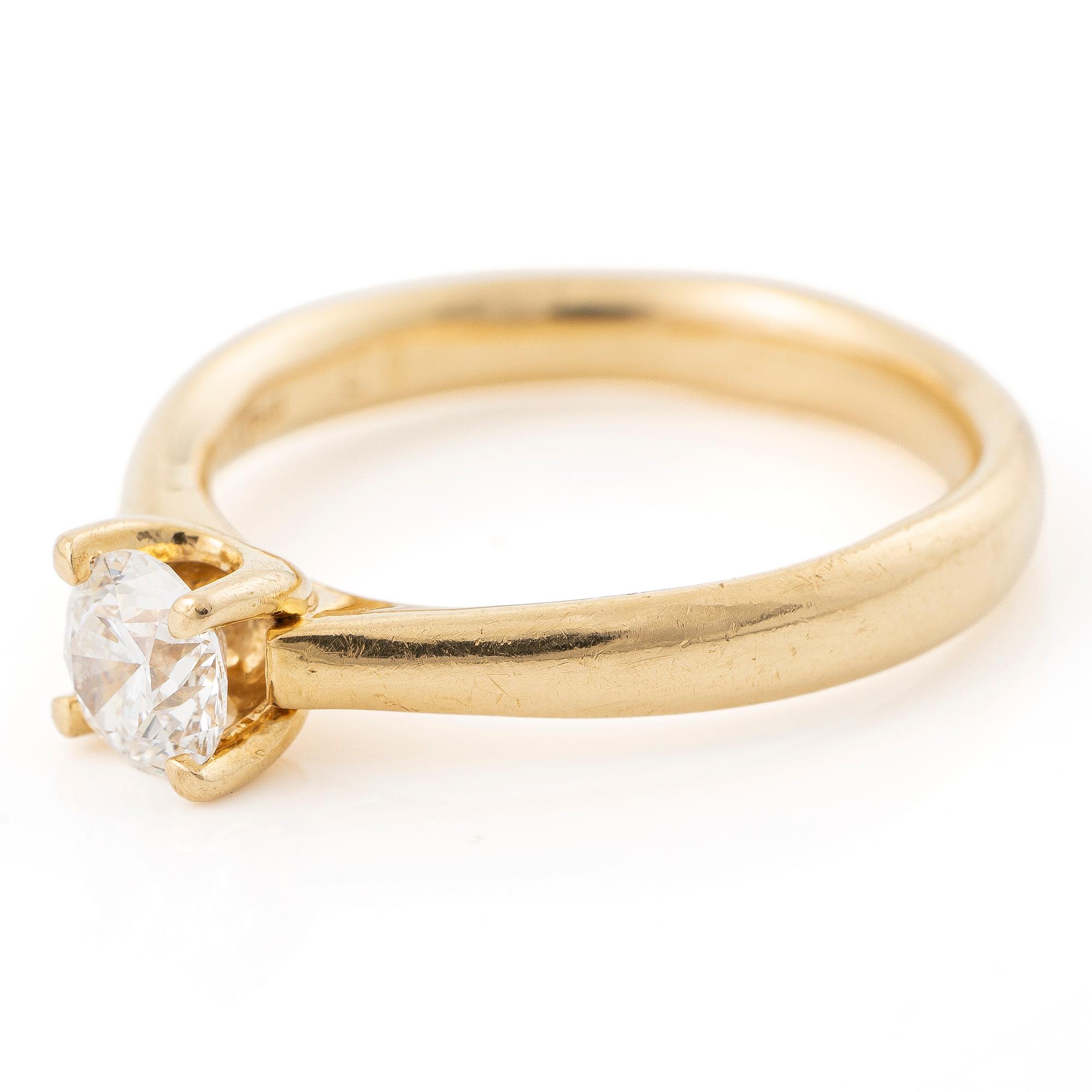 Ring, 18K gold with a brilliant-cut diamond.