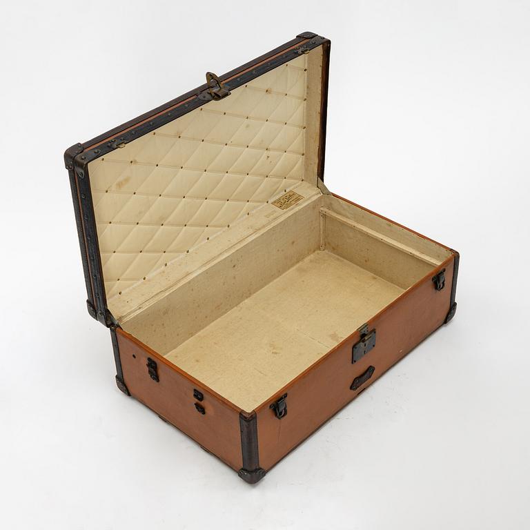 Louis Vuitton, orange Steem Trunk from the early 20th century.