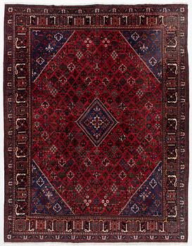 An oriental rug, c. 365 x 285 cm.