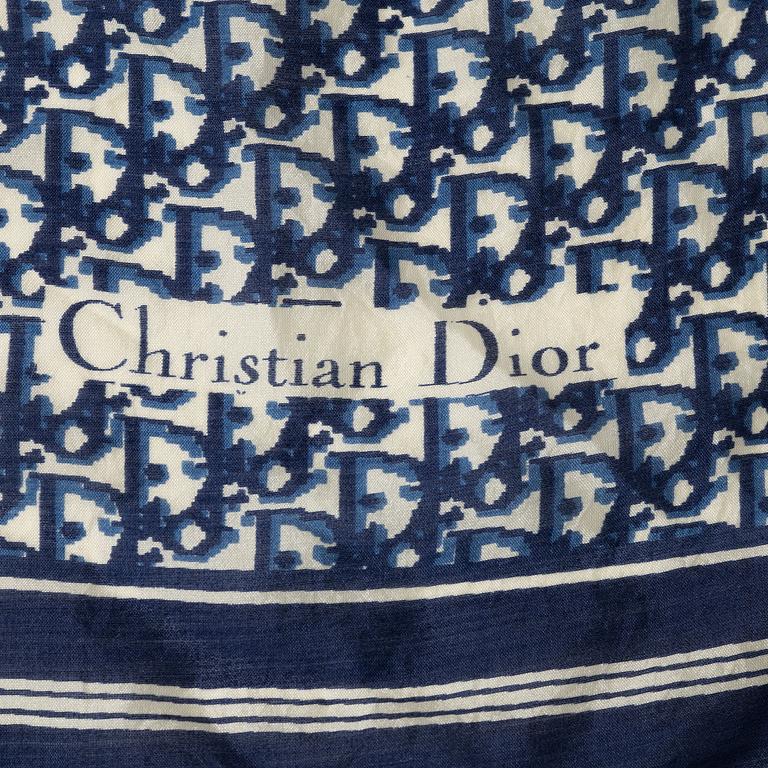 Christian Dior, a clutch and a scarf.