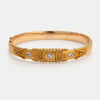 Oskar Lindroos, A 14K gold bracelet with diamond ca. 0.49 ct in total. Helsinki 1940s.