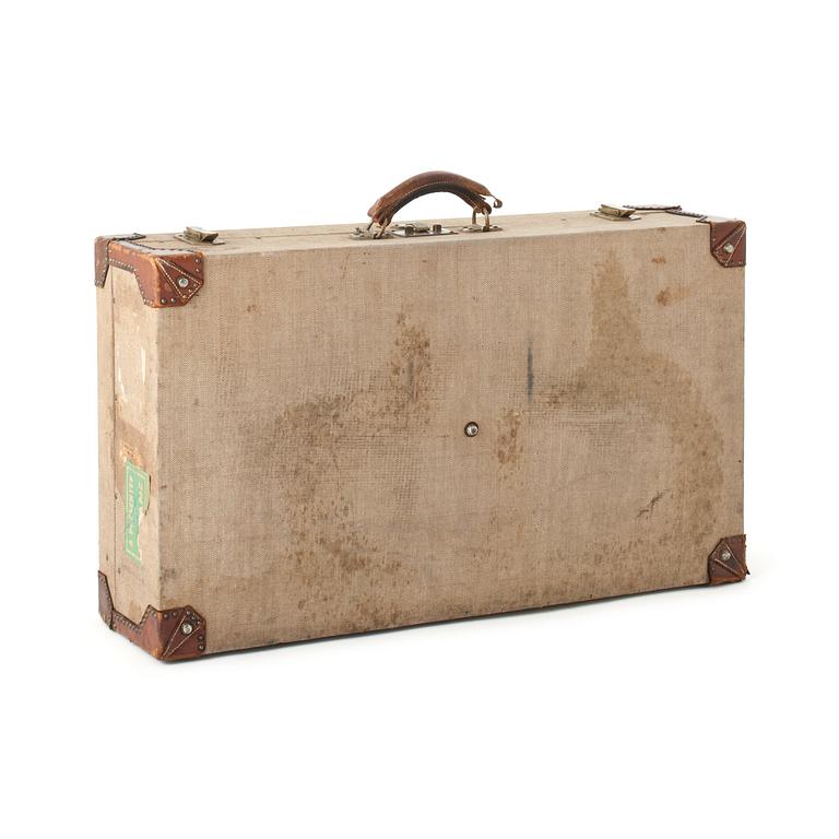 HERMÈS, a linen and leather suitcase, early 20th cent.