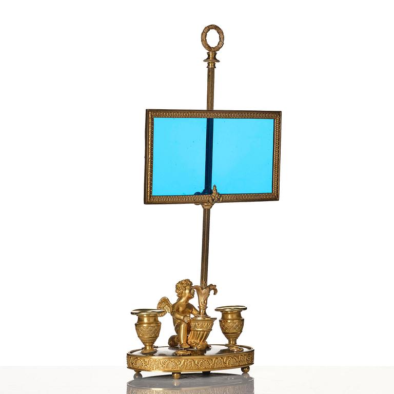 A Russian Empire ormolu and patinated bronse two-light lamp, early 19th century.