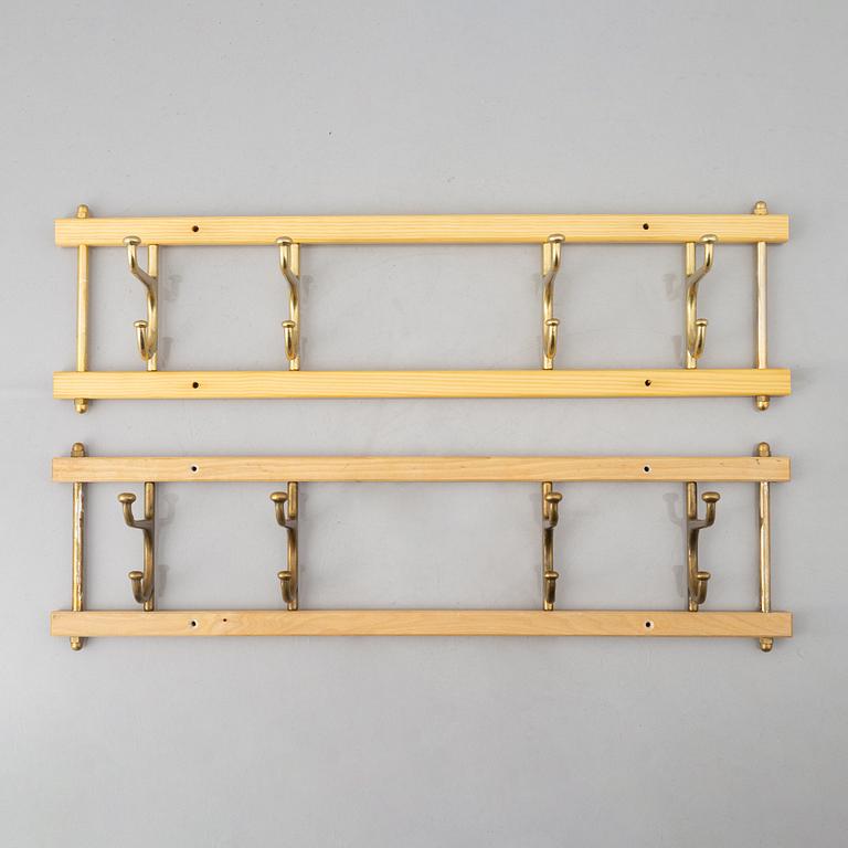 A pair of 'Dekorativ' coat hangers, Skoglunds metallgjuteri, Anderstorp, 1950's/60's.