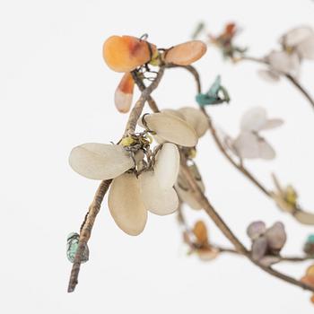 A decorative sculpture of a tree, made from nephrite, quartz, turkoise and lapis lazuli. China, 20th Century.