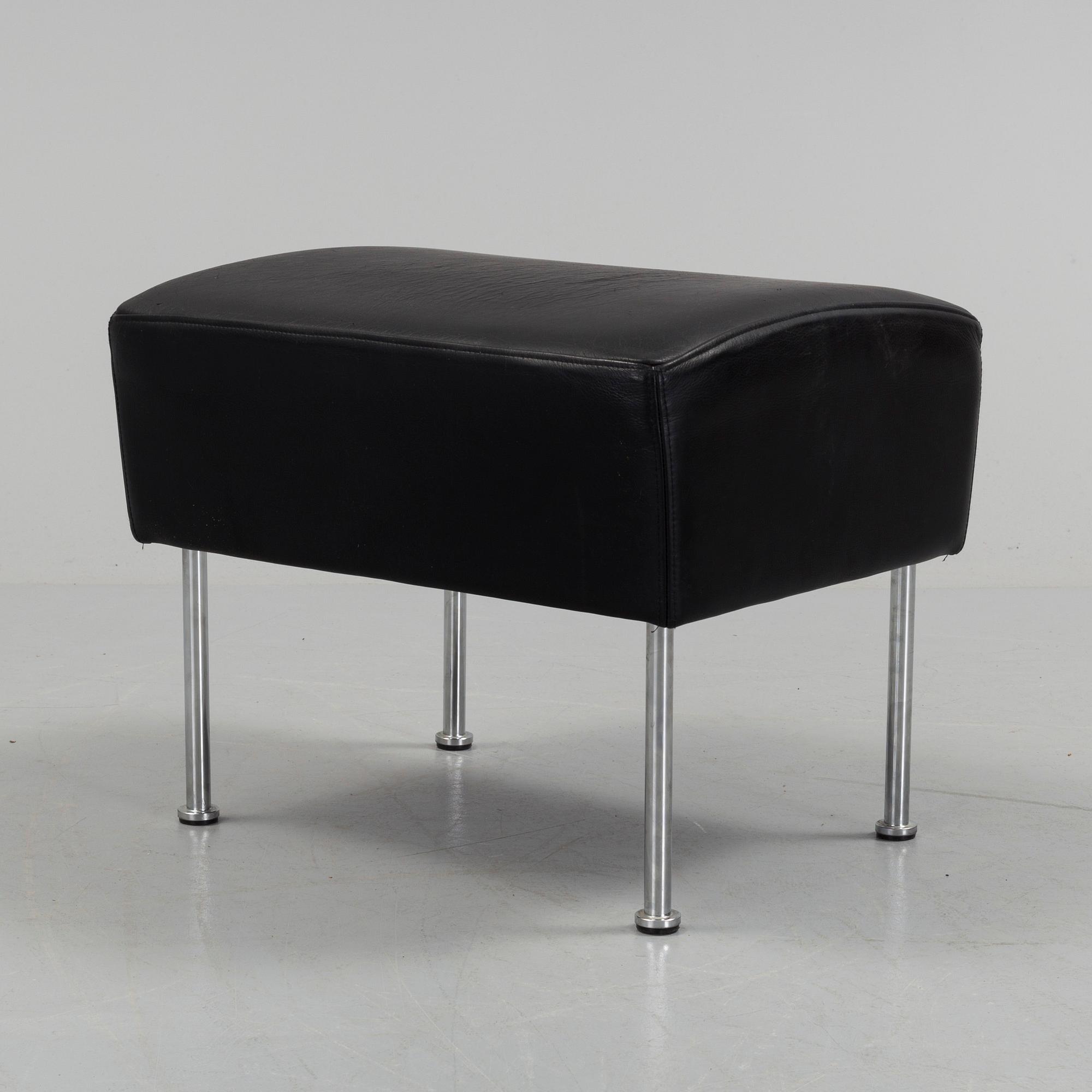 A "Cinema" footstool by Gunilla Allard.