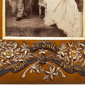 Royal wedding portrait depicting King Frederick VIII of Denmark and Louise of Sweden, 1869.