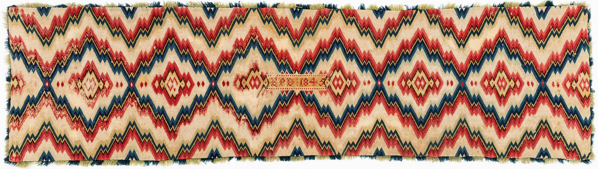 Åkdyna,  Skåne korsstygn och tvistsöm daterad 1845 EPD, ca 142 x 38 cm.