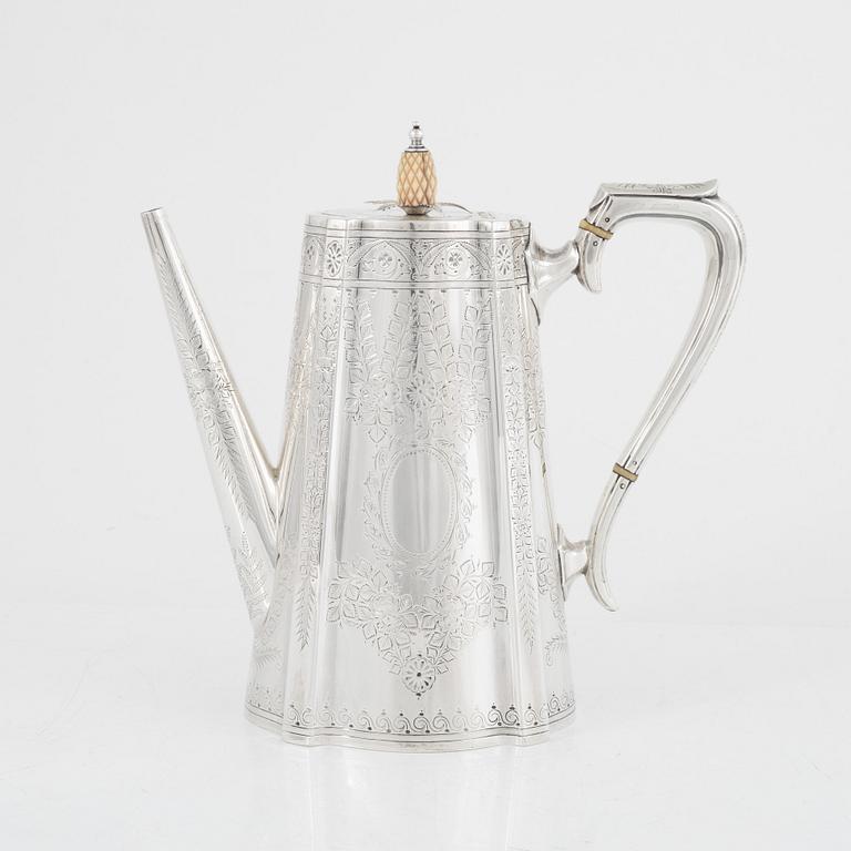 An English Silver Coffee Pot, Teapot, Creamer and Sugar Bowl, mark of Walker & Hall (John Edward Bingham) Sheffield 1891.