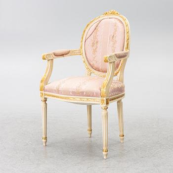 Dining table and armchair, Louis XVI style. Italy, second half of the 20th century.