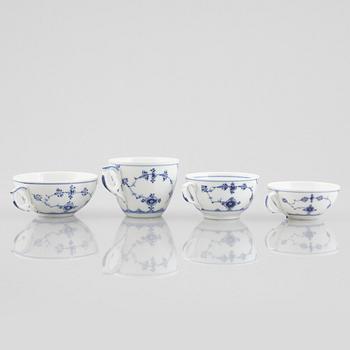 A group of four 'Blue Fluted' / 'Musselmalet rifflet' cups with saucers, Royal Copenhagen, 19th century and later.