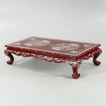 An East Asian table, made in the 1990s.