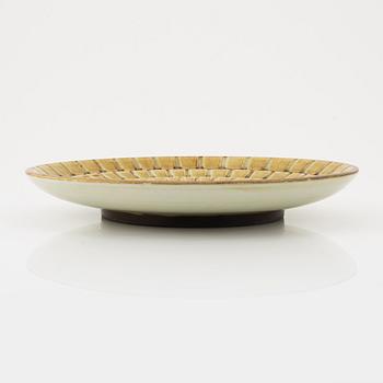 A stoneware plate by Gertrud Lönegren, Rörstrand, mid 20th Century.