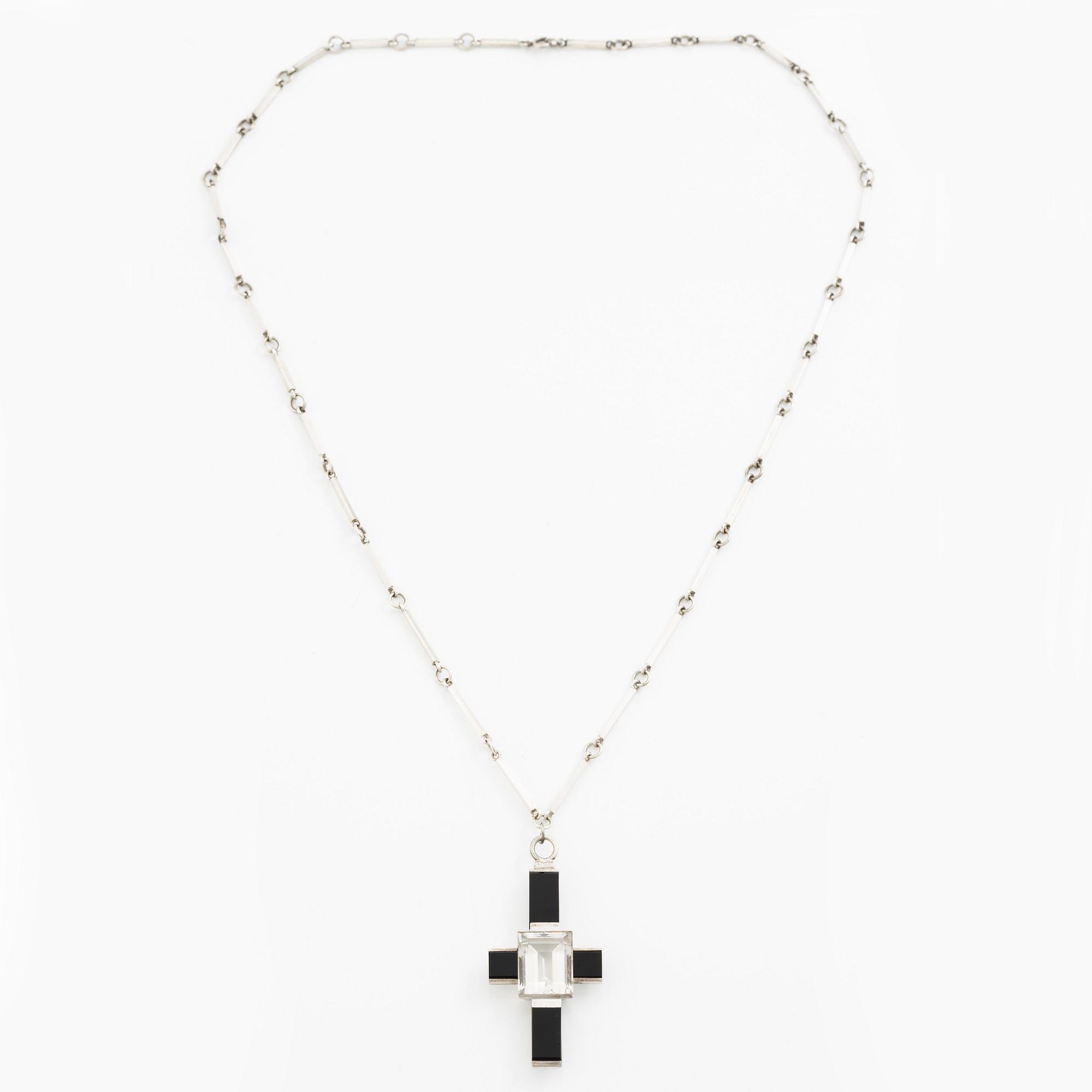 Wiwen Nilsson, a pendant in the form of a cross, sterling silver with onyx and step-cut rock crystal, Lund 1937.