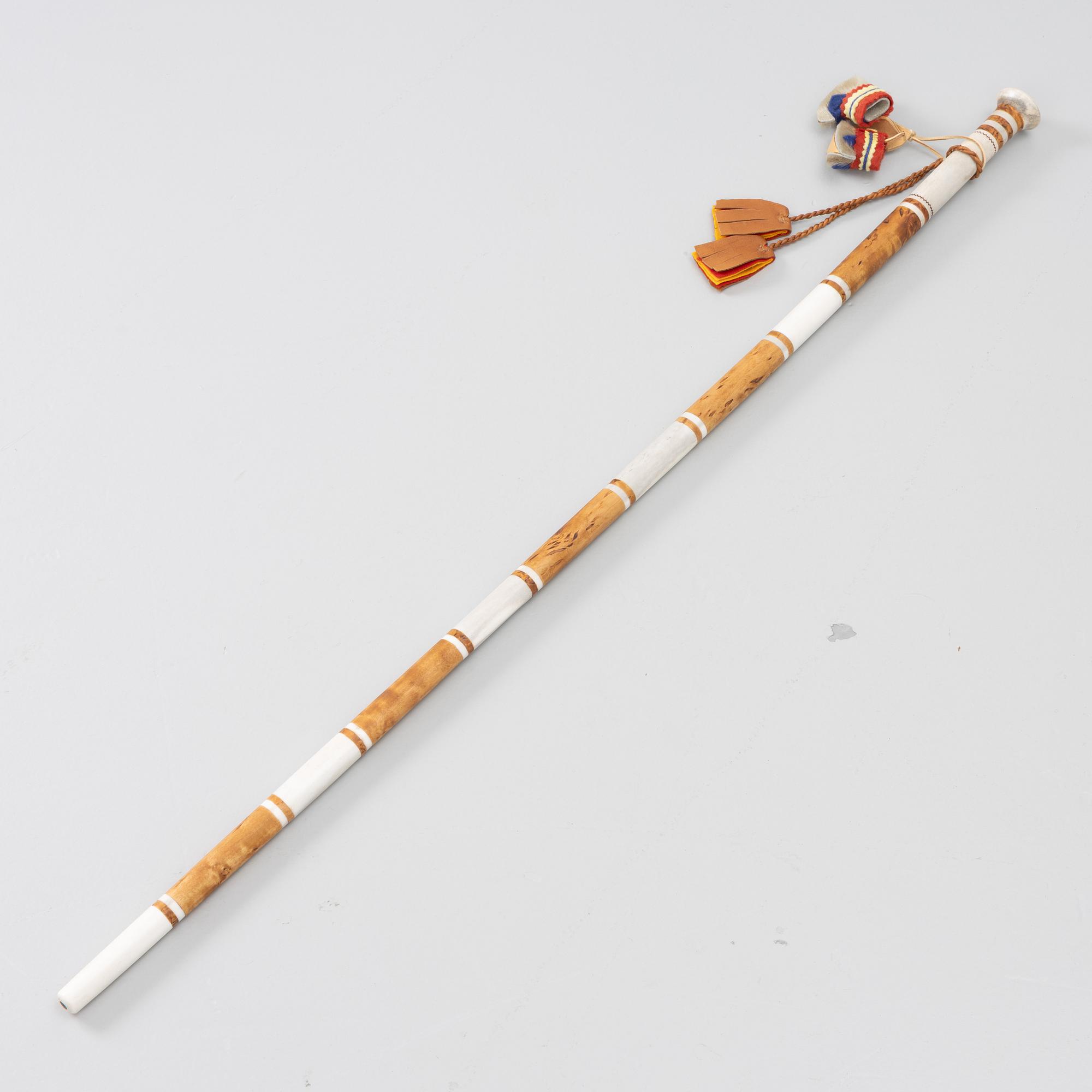 Lars Levi Sunna, a walking stick.