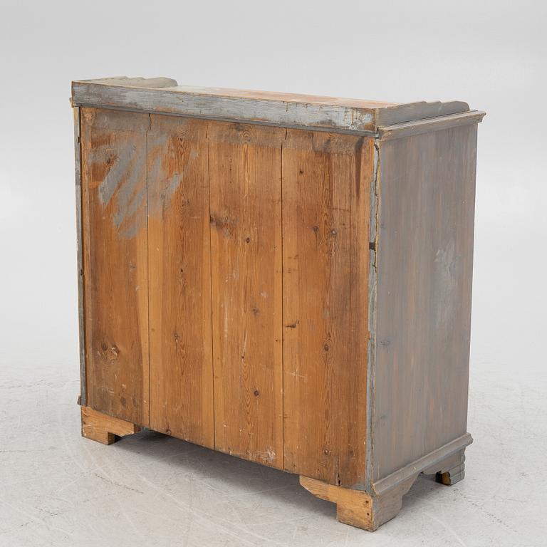 A Gustavian cupboard, circa 1800.