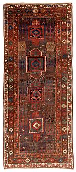 358. An antique Kurdish / Turkish carpet by the Herki Tribe, ca 276 x 116 cm.