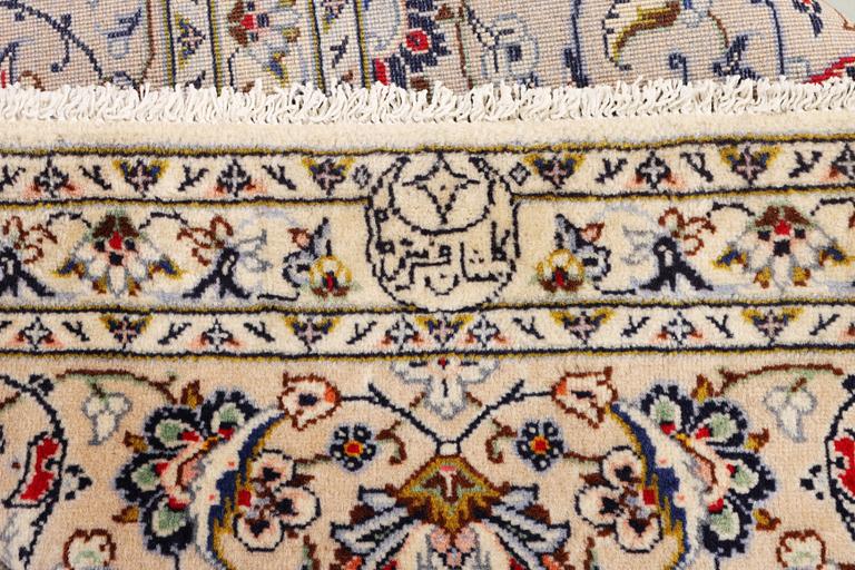 A Keshan carpet, c. 342 x 240 cm.