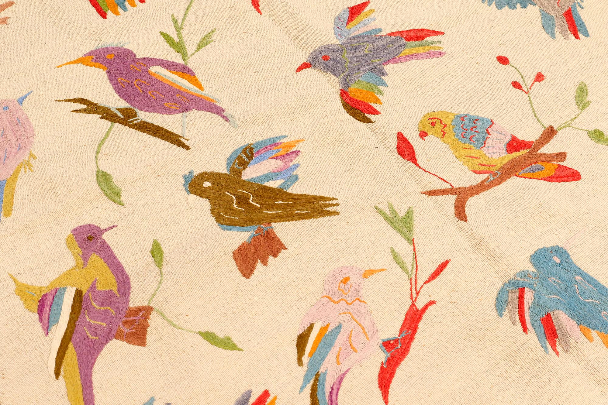 An embroided flat weave, ca 199 x 144 cm.