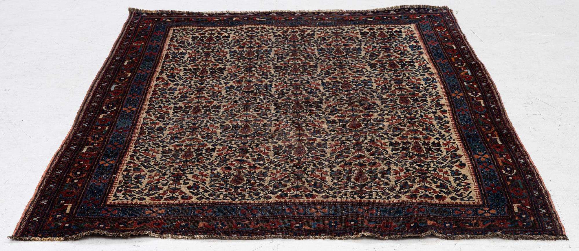 An antique Afshar rug, c. 153 x 124 cm.