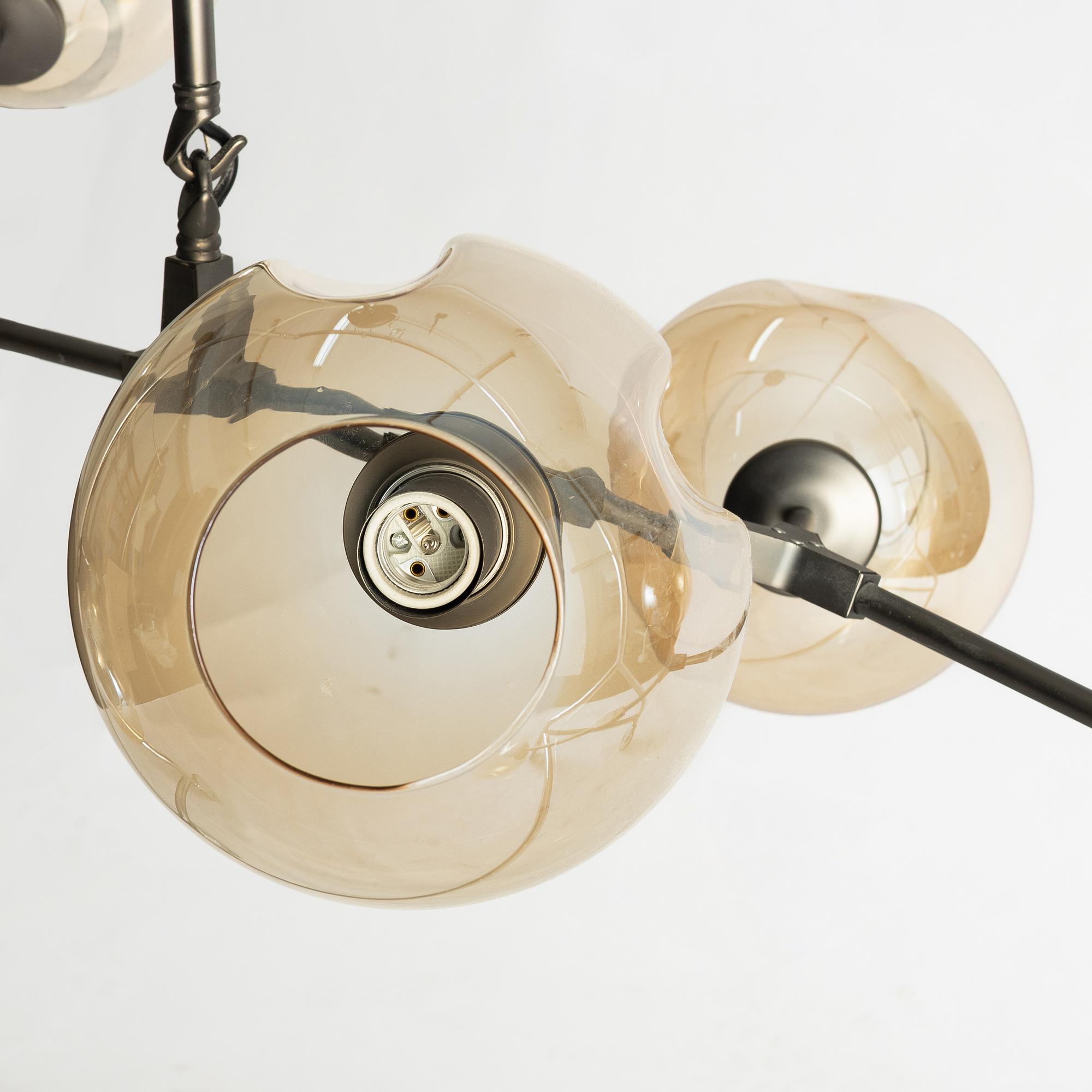 A ceiling lamp from Dusty Deco, 21st century.