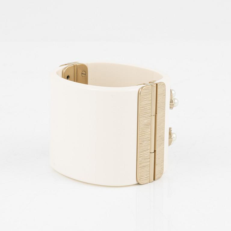 Chanel, a white acrylic bracelet with pearls, 2019.