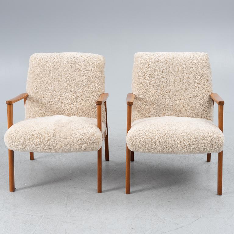 A pair of armchairs, mid-20th century.