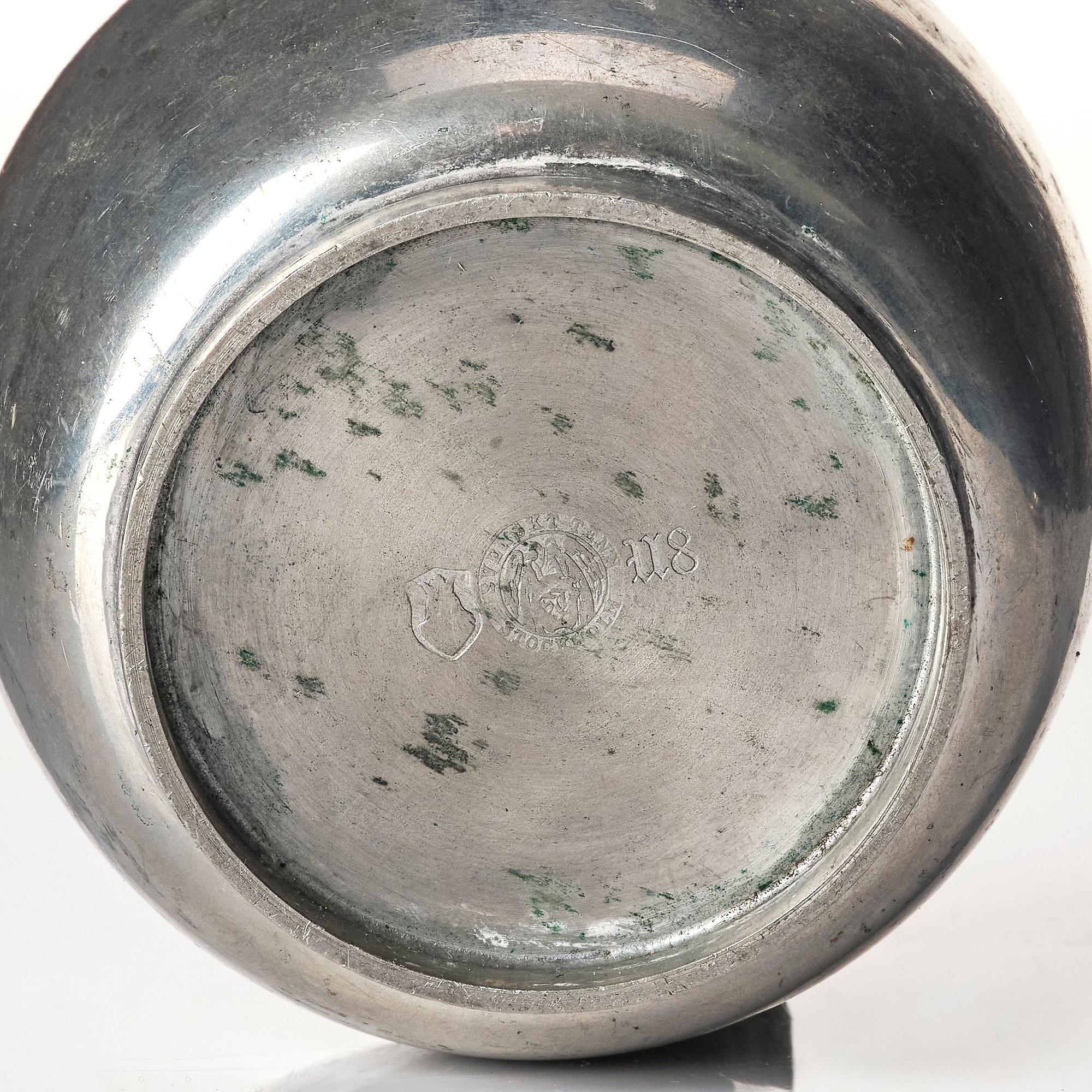 Josef Frank, a four pieces pewter tea service and a tray, model "A2330", Svenskt Tenn, Stockholm 1946 (tray 1929).