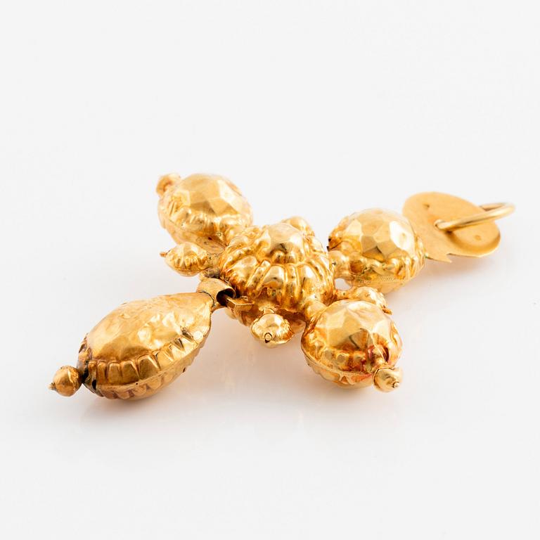 Hängsmycke 18K guld i form av ett kors.