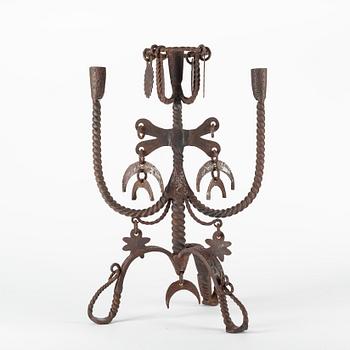 A SWedish wrought-iron four-light candlestick, circa 1900.