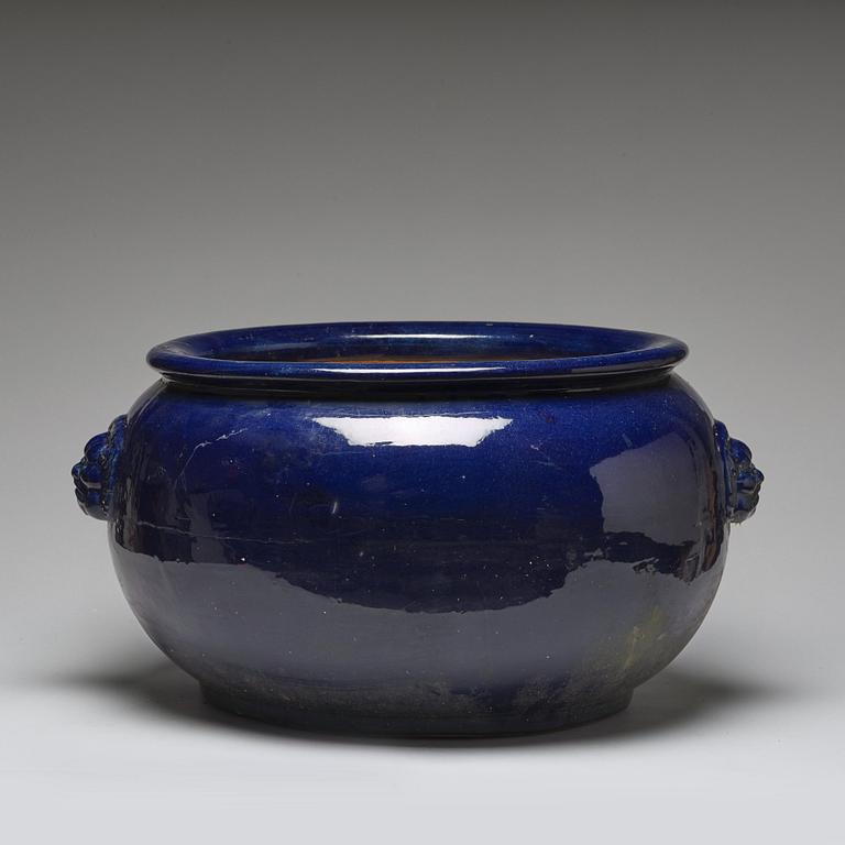 A large blue glazed flower pot/censer, presumably late Qing dynasty.