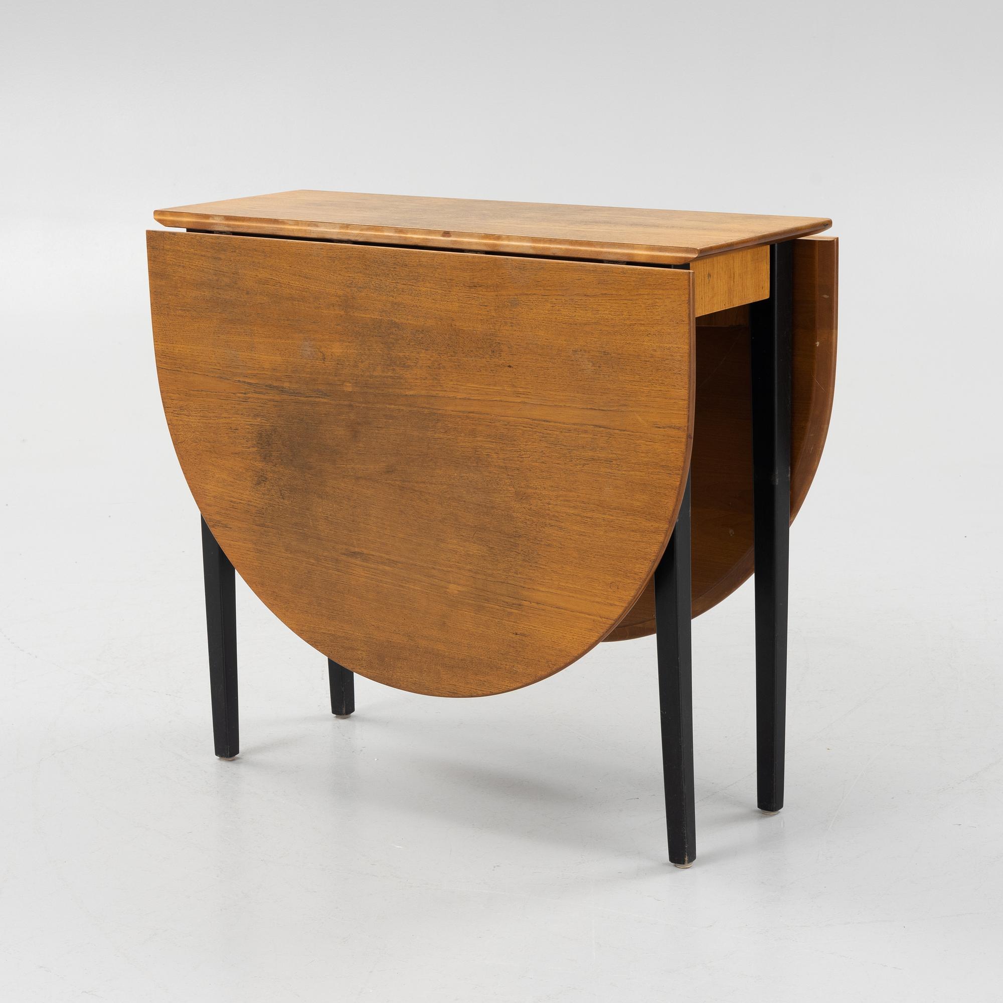 A gate-leg table, mid 20th Century.