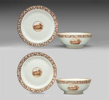 A pair of European subject famille rose punch bowls with stands, Qing dynasty, Jiaqing (1796-1820).