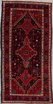 A CARPET Old West Persian, around 334 x 168 cm.