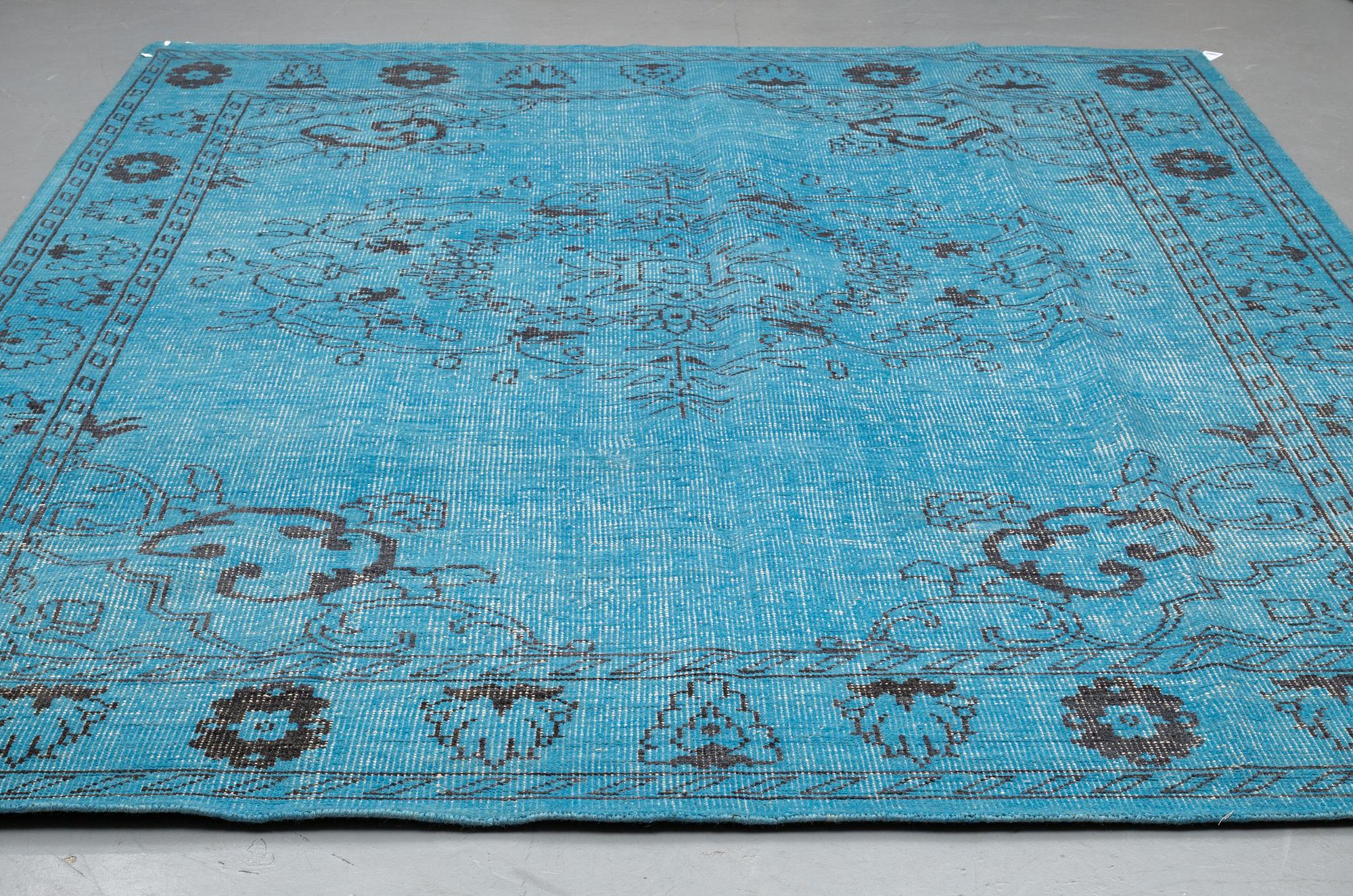 An oriental carpet, ca 365 x 264 cm.