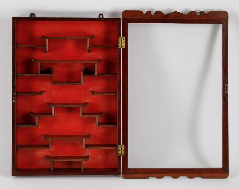 A Chinese wall display cabinet, second half of the 20th century.