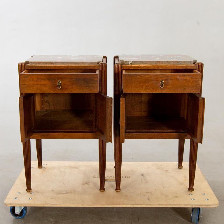 A pair of oak bedside tables beginning of the 20th century.