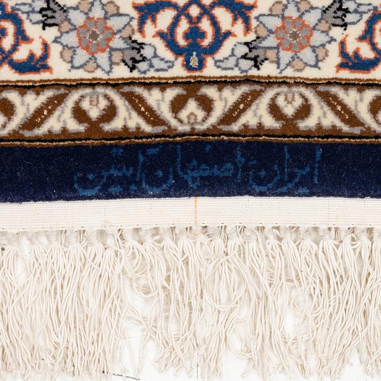 An Isfahan rug, c. 220 x 145 cm.