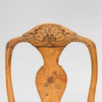 An assembled suite of ten rococo chairs, Western Sweden, later part 18th century.